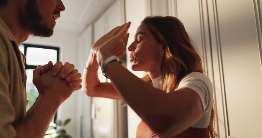 Angry, conflict and couple with argument in home for toxic marriage, betrayal and disagreement. Divorce, liar and frustrated people with conversation, relationship drama and fight for cheating affair