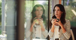 Home, thinking and woman drinking coffee by window for peace, calm or relax on weekend break with view. Tea cup, morning beverage or person in house for thoughts, reflection or daydreaming with latte - Powered by Shutterstock - Get 15% off with code: PIKWIZARD15