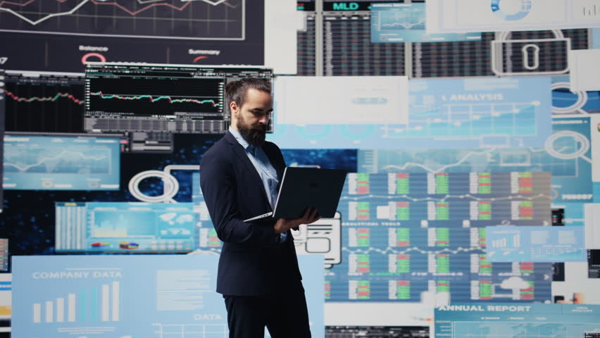 Data driven planning helps this professional to build a successful strategy for global business development. Using charts on dashboard and projections to guide his leadership ideas. Camera B.