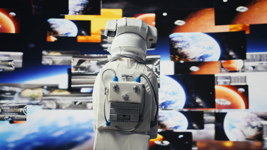 Young male cosmonaut drifting in zero gravity during a space walk, reflecting interstellar adventure, celestial wonder and the future of astronautics and planetary discovery. Space craft. Camera B.