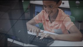 Boy logging onto laptop in classroom, typing, watching holographic charts, map rising in education. Education, technology, innovation, learning, digital, classroom, development - Powered by Shutterstock - Get 15% off with code: PIKWIZARD15