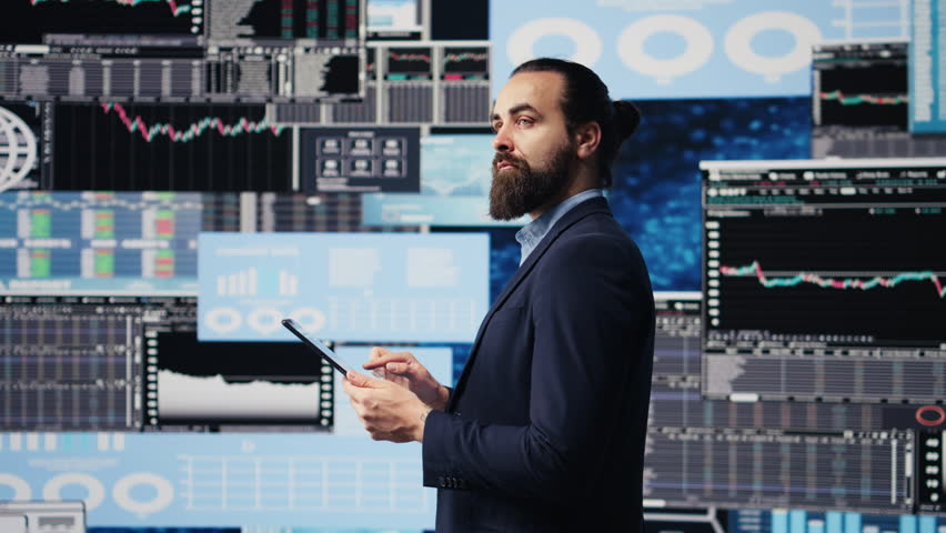 Professional businessman analyzing info and finance charts on digital dashboard, ensuring strategic planning with infographics on tablet. Leadership in fast paced corporate economy. Camera B.