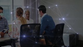 Five tech professionals collaborating around table activating network effect and tapping tablet. Collaboration, innovation, connectivity, teamwork, digital, modern, corporate - Powered by Shutterstock - Get 15% off with code: PIKWIZARD15