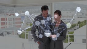 Business colleagues adjusting tablet and interacting hologram nodes, studying global connections. Technology, collaboration, digital, innovation, data, networking, workspace - Powered by Shutterstock - Get 15% off with code: PIKWIZARD15