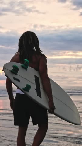 Man Surfer With Surf Board At Summer Sea Nature Or Ocean Water On Background. Young Male Person With Surfboard Looking Away At Coast Beach. Adult Boy Moving On In Tranquility Of Wet Sandy Shoreline