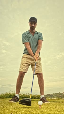 Adult Sports Man Playing on Green Golf Course and Hitting Ball with Club. Athletic Male Person is Real Winner at Championship Cup. Champion Kicking Golfball with Accuracy and Scoring with Birdie Slice