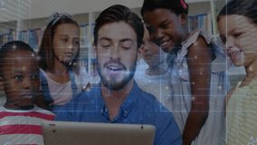 Instructor turning on tablet opening learning app tapping and explaining math concept to students. Education, classroom, technology, collaboration, discovery, engagement, youth - Powered by Shutterstock - Get 15% off with code: PIKWIZARD15