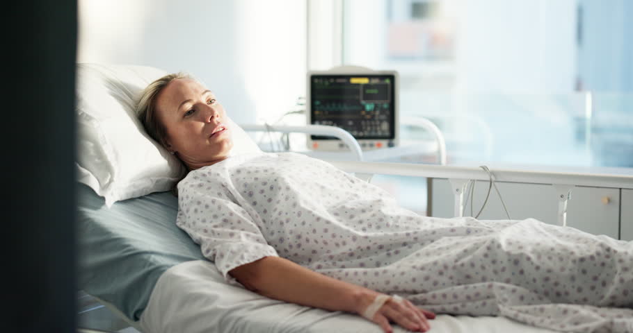 Thinking, hospital bed and woman with healthcare, sick and recovery with cancer diagnosis. Person, heart disease or patient in clinic, ecg monitor or healing with illness, anesthesia and depression