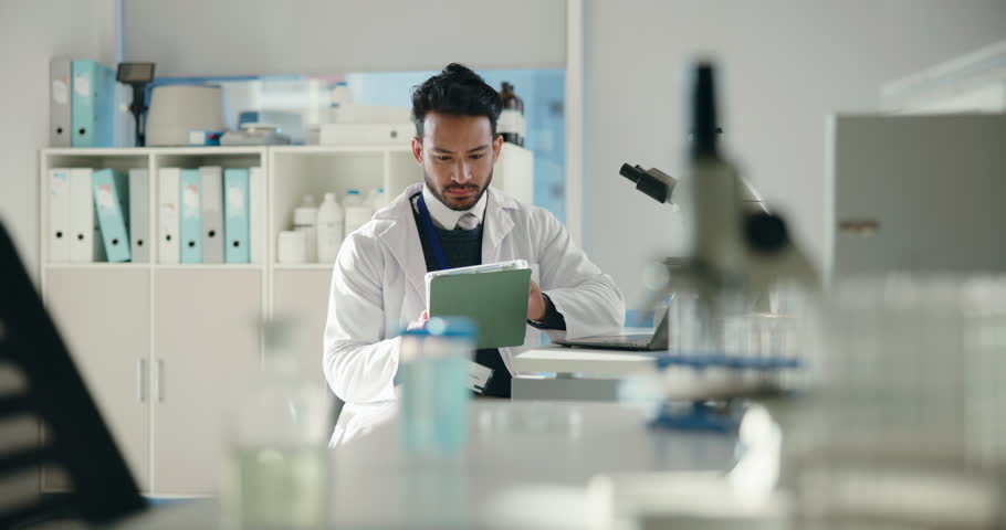 Microscope, science and laptop with man in laboratory for forensic, toxicology report and research. Medical analysis, pathology screening and tissue sample with person in clinic for investigation