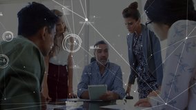 Man tapping tablet screen and team visualizing business project data with animated network nodes. Collaboration, teamwork, data visualization, modern office, analytics, digital interface, corporate - Powered by Shutterstock - Get 15% off with code: PIKWIZARD15