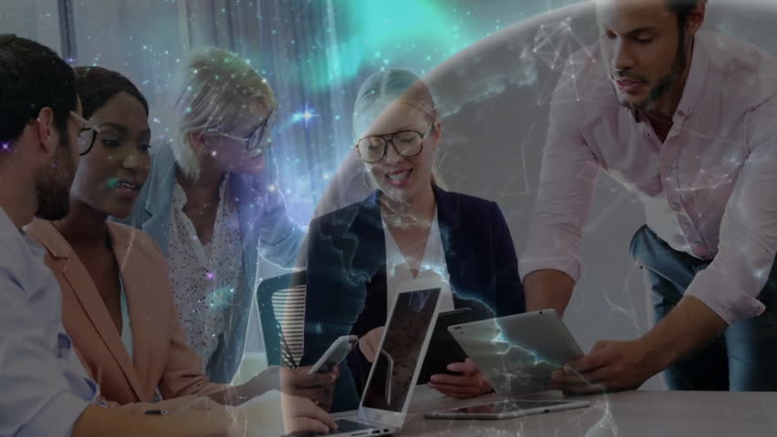 Business team raising laptops, tablets around table, revealing 3D globe showing global network. Collaboration, innovation, technology, teamwork, professionalism, digital, connectivity - Powered by Shutterstock - Get 15% off with code: PIKWIZARD15