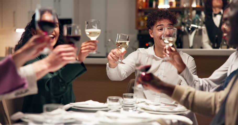 Business, people or cheers with celebration at restaurant for company success, goals or achievement. Client dinner, employees and alcohol toast for partnership deal, networking or team building event