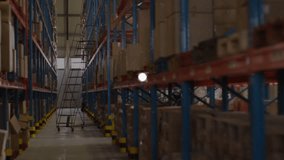 After pause, digital globe of face icons rotating and expanding to show network growth in warehouse. Futuristic, technology, data, cyber, connectivity, digital, industrial - Powered by Shutterstock - Get 15% off with code: PIKWIZARD15