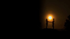 Two women hold hands in silhouette atop a hill at sunset, creating a romantic summer scene with space for text and warm vibes. - Powered by Shutterstock - Get 15% off with code: PIKWIZARD15