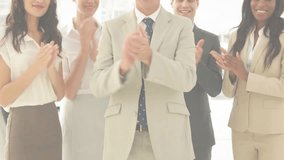 Business team applauding success following network overlay scrolling in office space. Collaboration, teamwork, celebration, innovation, digital, corporate, diversity - Powered by Shutterstock - Get 15% off with code: PIKWIZARD15