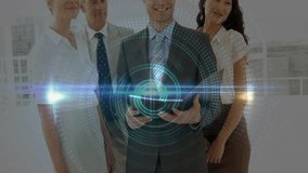 Business team in office tapping tablet and generating swirling holographic data rings for analysis. Collaboration, innovation, futuristic, technology, corporate, communication, digital - Powered by Shutterstock - Get 15% off with code: PIKWIZARD15