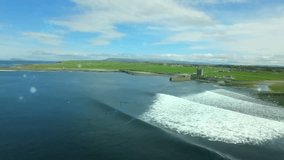 Swell building cresting foam wave by pier while teal molecules drifting down visualizing network. Ocean, coastline, surf, foam, wave, maritime, digital - Powered by Shutterstock - Get 15% off with code: PIKWIZARD15