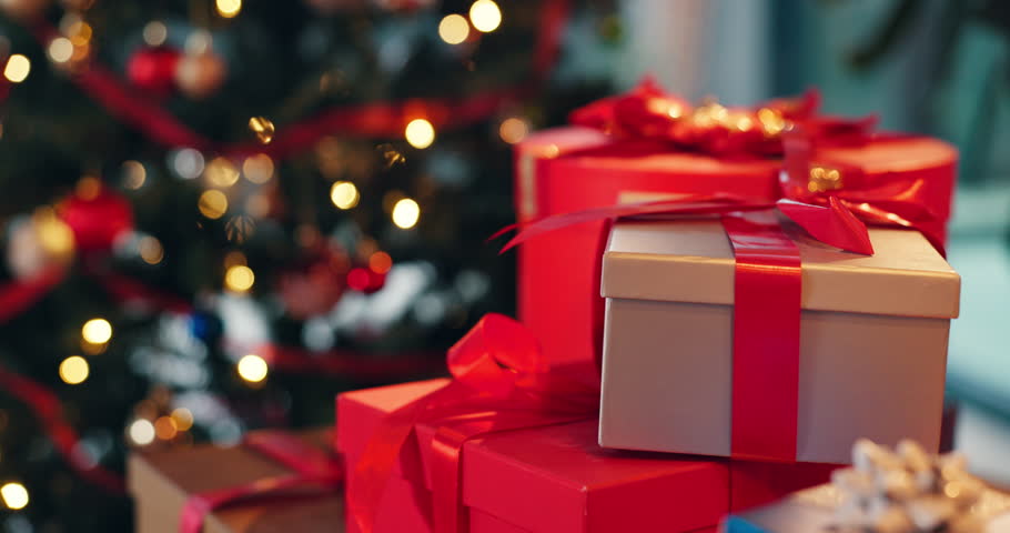 Empty, house and boxes with gift for Christmas event, decoration and festive celebration. Package, gold parcel and xmas present with ribbon, red color or lights for holiday season tradition in home
