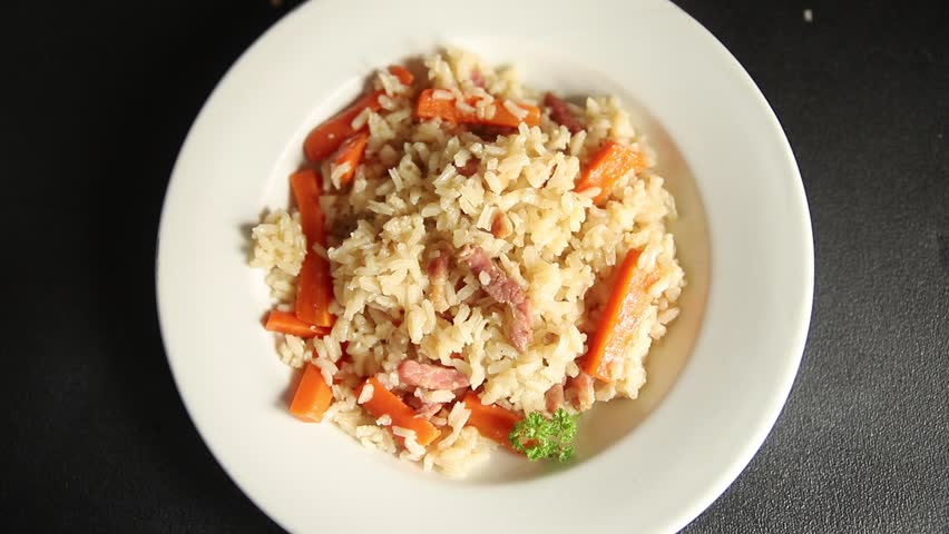 Rice meat and vegetables pilaf fresh delicious gourmet food background on the table rustic food top view copy space