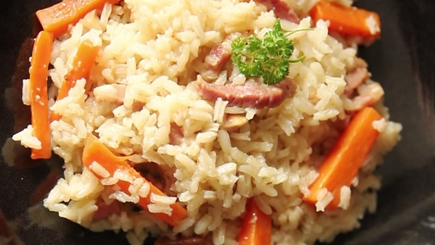 Rice meat and vegetables pilaf fresh delicious gourmet food background on the table rustic food top view copy space