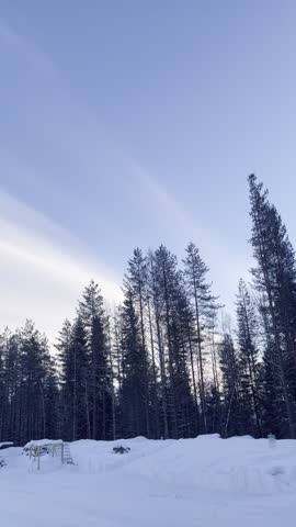 sky in snowy Finland, walking on endless road covered with snow
