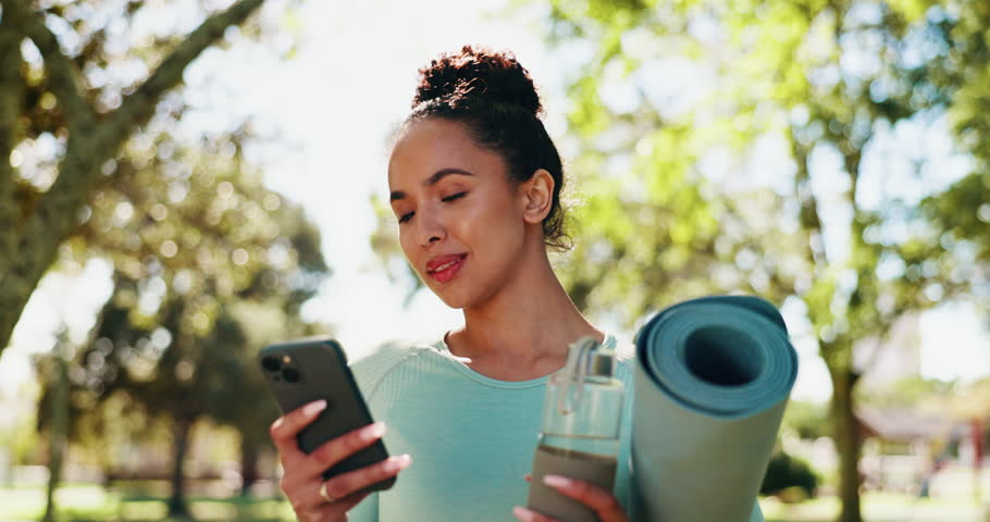 Woman, yoga mat and phone at park, texting and smile on walk with search for location in summer. Girl, smartphone and outdoor with water bottle for fitness, contact or social media in Costa Rica