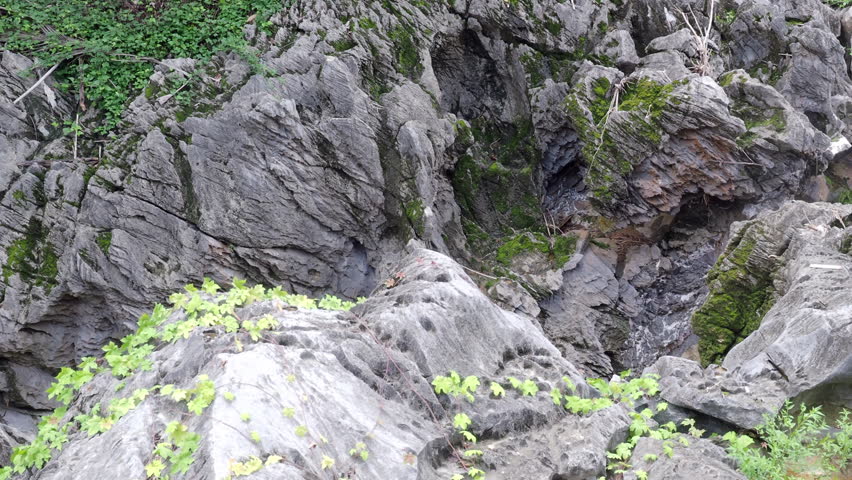 Klong Hin Dam River, natural black stone tunnel