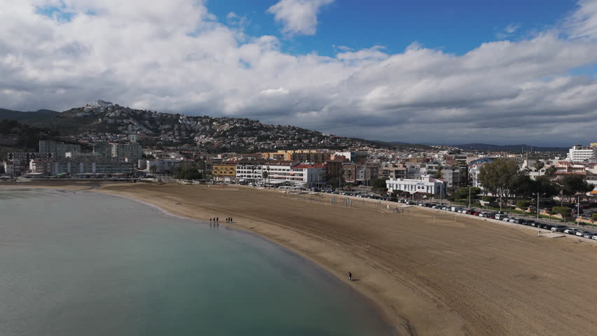 Aerial over Playa Sur beach and sea curve in Peniscola, Spain with soft daylight