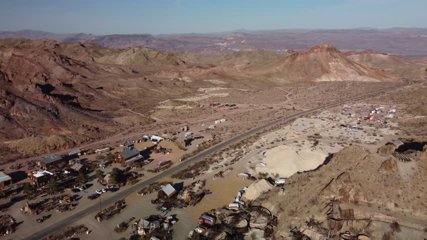 Sideways slide Drone flight facing northeast over the popular ghost town of Nelson in Eldorado Canyon, Nevada
