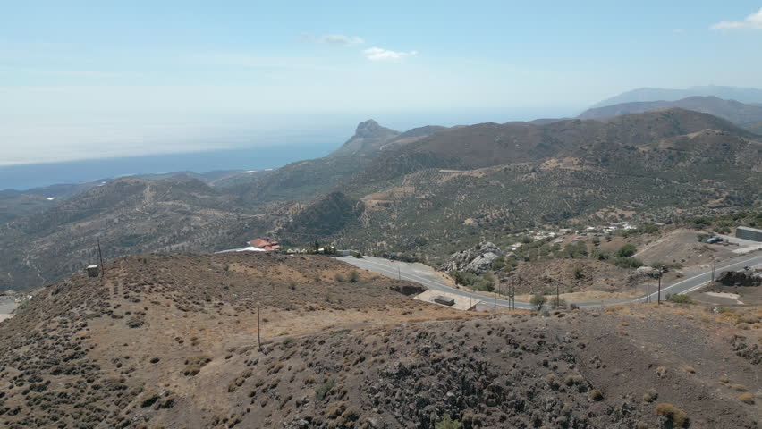 Beautiful Greek Church Atop Cliff In South Crete Drone Track Back 4K 60FPS