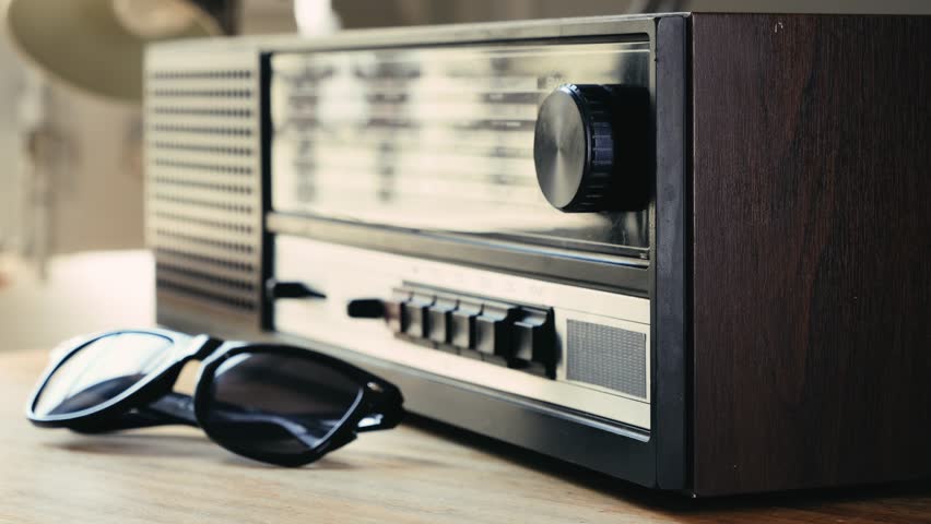 Old Retro AM FM Radio with tubes, Hand Changing stations , bulb vintage music player.