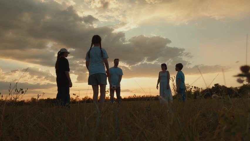 happy family silhouette, mother father child playing ball sunset, family dream, crowd child kid running across green field, child running after ball park, kid playing ball park, child schoolchildren