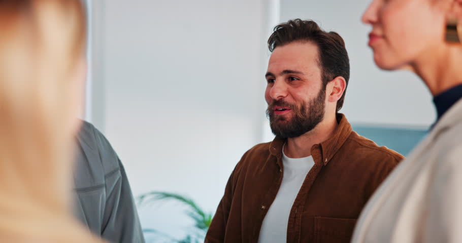 Smile, therapy and support with people in office for mental health, meeting and recovery. Counseling session, trust and happiness with group laughing in workshop for rehabilitation and psychology