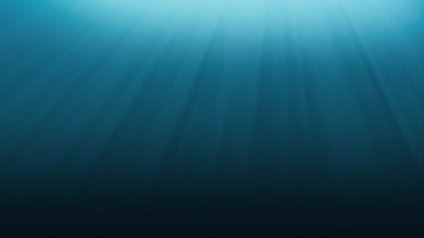 Elegant rays of sunlight shining from above penetrate deep clear blue water.  Small bubbles rising up. Seamless looping 4K animation.