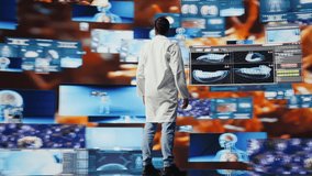 Medic expert uses tools and smart health systems to provide health solutions, showcasing scientific advancement in diagnostics and the future of healthcare through modern technology. Camera B. - Powered by Shutterstock - Get 15% off with code: PIKWIZARD15