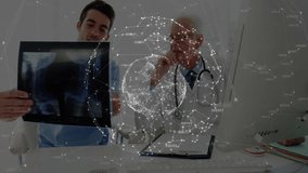 Junior doctor lifting X-ray film to review data, senior doctor consulting, network globe fading in. Medical, collaboration, professional, diagnostics, healthcare, technology, consultation - Powered by Shutterstock - Get 15% off with code: PIKWIZARD15