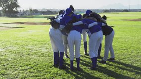 Eight baseball players cheering in huddle at infield while social media icons rising across frame. Athletes, camaraderie, team spirit, sportswear, outdoor activity, competitive, unity - Powered by Shutterstock - Get 15% off with code: PIKWIZARD15