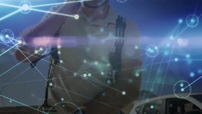 Technician wearing helmet raising phone, initiating data call at wind farm via pulsing overlay. Technology, renewableenergy, innovation, industrial, communication, outdoor, futuristic - Powered by Shutterstock - Get 15% off with code: PIKWIZARD15