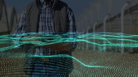 Field technician walking between solar panels and updating live data wave by tapping tablet screen. Renewable, technology, innovation, digital, energy, sustainability, industry - Powered by Shutterstock - Get 15% off with code: PIKWIZARD15