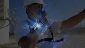 Supervisor issuing radio command entering energy site and pointing at wind turbines under overlay. Industrial, communication, technology, supervision, sustainability, engineering, outdoor - Powered by Shutterstock - Get 15% off with code: PIKWIZARD15