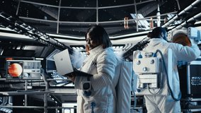 Cosmonaut leaving starship after landing on planet, waving hand to colleague. Astronaut stepping out of space station for scheduled operations to study cosmic origins, camera A - Powered by Shutterstock - Get 15% off with code: PIKWIZARD15