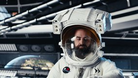 Portrait of joyful astronaut holding helmet doing scheduled operations in starship exploring deep space. Upbeat cosmonaut inspecting spacecraft hull after leaving planet, camera B - Powered by Shutterstock - Get 15% off with code: PIKWIZARD15