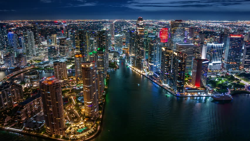 This mesmerizing hyperlapse captures the stunning essence of Downtown Miami and Brickell Key, showcasing the vibrant city lights and the dynamic skyline illuminated beautifully at night