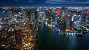 This mesmerizing hyperlapse captures the stunning essence of Downtown Miami and Brickell Key, showcasing the vibrant city lights and the dynamic skyline illuminated beautifully at night - Powered by Shutterstock - Get 15% off with code: PIKWIZARD15