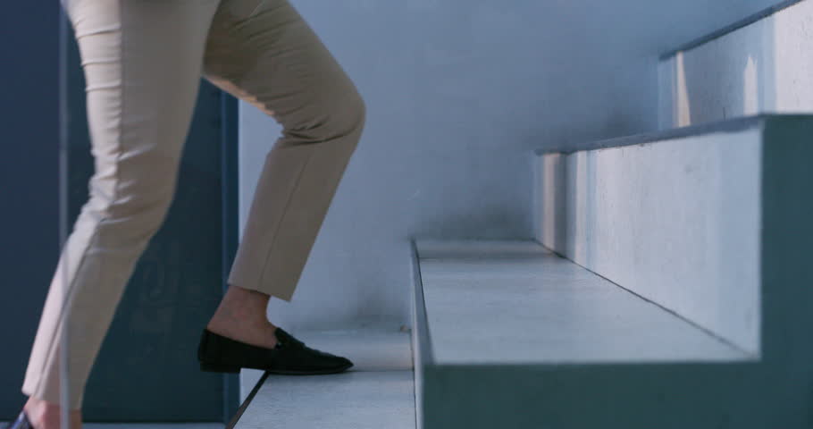 Walking, steps and shoes of business woman in office for growth, opportunity or climbing career ladder. Stairs, travel and journey with closeup of feet of employee for professional progress and goals