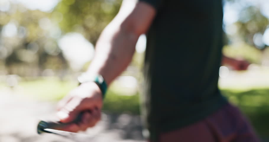 Exercise, hands and skipping with person outdoor for cardio training or intense workout closeup. Energy, fitness and jump rope with athlete in nature or park for health, sports or wellness routine