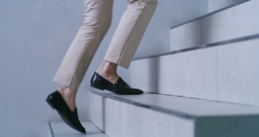 Floor, steps and shoes of business woman in office for growth, opportunity or walking career ladder. Stairs, travel and journey with closeup of feet of employee for professional progress and goals
