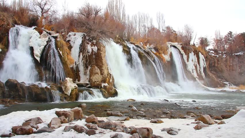Breathtaking winter landscape cascading waterfalls frozen in ice.Muradiye Waterfall Muradiye District. Van, Turkey. Beautiful waterfall landscape on winter. Waterfall is a natural wonder near Van Lake