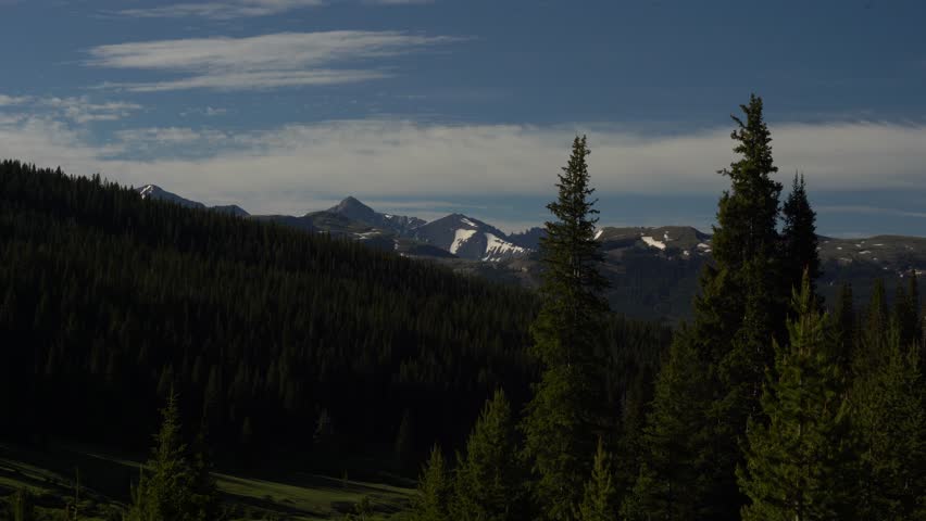 Views of mountain peaks can be seen in the distance as you find your way on the Uneva Peak Trail. The birds continue as the wind flows. Colorado Rockies at its finest. 