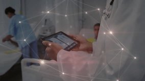 Healthcare doctor tapping tablet and revealing glowing data overlay while nurse adjusting IV line. Medical, technology, diagnostics, interface, collaboration, clinical, safety - Powered by Shutterstock - Get 15% off with code: PIKWIZARD15